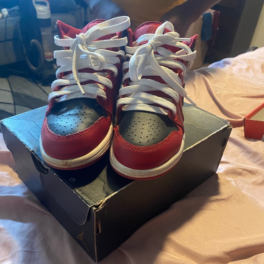 Black and Red Jordan 1 Mid